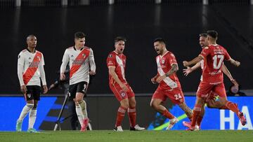 Soccer Football - Copa Libertadores - Round of 16 - First leg - River Plate v Argentinos Juniors - Estadio Monumental, Buenos Aires, Argentina - July 14, 2021 Argentinos Juniors&#039; Gabriel Hauche celebrates scoring their first goal with teammates Pool via REUTERS/Juan Mabromata