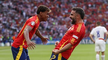 BERLIN, GERMANY - JUNE 15: Daniel Carvajal of Spain celebrates scoring his team's third goal with teammate Lamine Yamal during the UEFA EURO 2024 group stage match between Spain and Croatia at Olympiastadion on June 15, 2024 in Berlin, Germany. (Photo by Julian Finney/Getty Images)