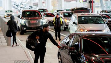 Record numbers will hit the road for Thanksgiving as winter weather hits