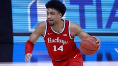 INDIANAPOLIS, INDIANA - MARCH 14: Justice Sueing #14 of the Ohio State Buckeyes drives to the basket in the game against the Illinois Fighting Illini during the first half of the Big Ten Basketball Tournament championship at Lucas Oil Stadium on March 14,