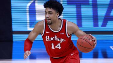 INDIANAPOLIS, INDIANA - MARCH 14: Justice Sueing #14 of the Ohio State Buckeyes drives to the basket in the game against the Illinois Fighting Illini during the first half of the Big Ten Basketball Tournament championship at Lucas Oil Stadium on March 14,