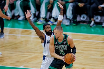 Boston Celtics center Kristaps Porzingis (R) of Latvia in acton against Dallas Mavericks 