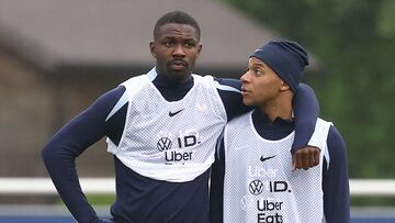 Marcus Thuram y Kylian Mbappé.