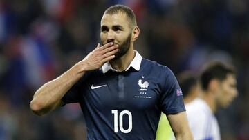 (FILES) This file photo taken on October 09, 2015 shows French forward Karim Benzema celebrating after scoring a goal during the friendly football match between France and Armenia on October 8, 2015 at the Allianz Riviera stadium in Nice, southeastern Fra