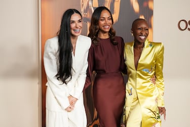 Demi Moore, Zoe Saldaña y Cynthia Erivo posan durante la alfombra roja de la recepción de los nominados a los Oscar 2025 en la Academy Museum of Motion Pictures de Los Angeles.