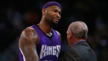 DeMarcus Cousins y George Karl.