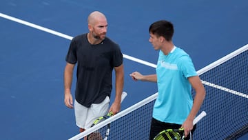 NEW YORK, NEW YORK - AUGUST 30: Adrian Mannarino of France speaks with Fabian Marozsan of Hungary after defeating him in their Men's Singles Second Round match on Day Two of the 2023 US Open at the USTA Billie Jean King National Tennis Center on August 30, 2023 in the Flushing neighborhood of the Queens borough of New York City.   Mike Stobe/Getty Images/AFP (Photo by Mike Stobe / GETTY IMAGES NORTH AMERICA / Getty Images via AFP)