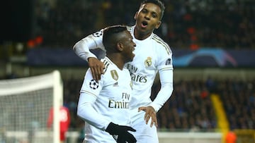 BRUGGE, BELGIUM - DECEMBER 11: Vinicius Junior of Real Madrid celebrates after scoring his team's second goal with Rodrygo of Real Madrid during the UEFA Champions League group A match between Club Brugge KV and Real Madrid at Jan Breydel Stadium on