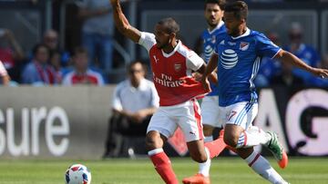 Jul 28, 2016; San Jose, CA, USA; Arsenal forward Theo Walcott (14) battlles for the ball with MLS All-Star Team midfielder Giovani Dos Santos (17) during the first half of the 2016 MLS All-Star Game at Avaya Stadium. Mandatory Credit: Kyle Terada-USA TODAY Sports