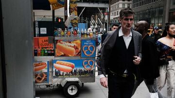 People walk through Manhattan on March 31, 2022 in New York City. 