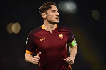 Totti wears the Roma shirt like a tattoo. Oh, now there's an idea, Francesco!