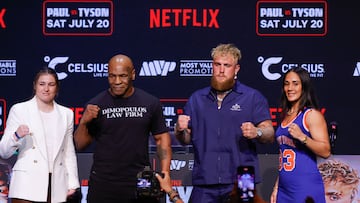 (From L) Irish boxer Katie Taylor, US former boxer Mike Tyson, YouTuber Jake Paul and Puerto Rican boxer Amanda Serrano pose at a press conference at the Apollo Theatre in New York, on May 13, 2024. Former heavyweight boxing champion Mike Tyson's July 20 fight against YouTube sensation Jake Paul in Dallas will be a sanctioned heavyweight professional bout, fighters and promoters announced on April 29. The fight will be over eight two-minute rounds with the result to count on the record of both Paul and Tyson, who lost his last official bout in 2005. (Photo by Kena Betancur / AFP)