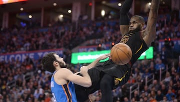 Feb 13, 2018; Oklahoma City, OK, USA; Cleveland Cavaliers forward LeBron James (23) dunks the ball over Oklahoma City Thunder guard Alex Abrines (8) during the second quarter at Chesapeake Energy Arena. Mandatory Credit: Mark D. Smith-USA TODAY Sports