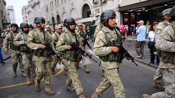 Soldiers take a position to prevent protesters from entering San Martin square in Lima, on December 15, 2022, during a nationwide state of emergency. - Peru's supreme court on Thursday opened a hearing to decide whether to free ousted president Pedro Castillo or extend his detention for 18 months. Castillo was arrested last week after he was impeached by Congress following his attempt to dissolve parliament and rule by decree. His arrest has sparked a week of violent protests between his supporters and the security forces that have left seven people dead and around 200 injured.
Dina Boluarte, the former vice-president who was quickly sworn in after Castillo's arrest, on Wednesday declared a nationwide state of emergency for 30 days. (Photo by MARTIN BERNETTI / AFP) (Photo by MARTIN BERNETTI/AFP via Getty Images)