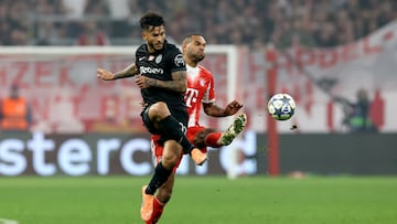 MUNICH, GERMANY - DECEMBER 09: Luis Suarez of Sporting Clube de Portugal battles for possession with Jonathan Tah of FC Bayern Munich during the UEFA Champions League 2025/26 League Phase MD6 match between FC Bayern München and Sporting Clube de Portugal at Football Arena Munich on December 09, 2025 in Munich, Germany. (Photo by Alexander Hassenstein/Getty Images)