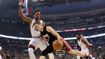 Nov 4, 2016; Toronto, Ontario, CAN; Miami Heat guard Goran Dragic (7) dribbles the ball as Toronto Raptors guard DeMar DeRozan (10) defends in the first quarter at Air Canada Centre. Mandatory Credit: Dan Hamilton-USA TODAY Sports