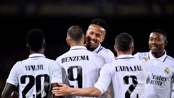 Real Madrid's French forward Karim Benzema (C) celebrates with teammates after scoring his team's fourth goal during the Copa del Rey (King's Cup) semi-final second leg football match between FC Barcelona and Real Madrid CF at the Camp Nou stadium in Barcelona on April 5, 2023. (Photo by Pau BARRENA / AFP)