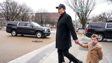 Elon Musk walks with his son X Æ A-12, on the day he meets with Indian Prime Minister Narendra Modi at Blair House, in Washington, D.C., U.S., February 13, 2025. REUTERS/Nathan Howard
