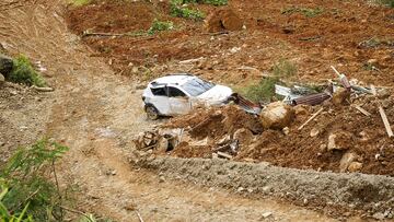 A view shows a damaged car amid debris in the aftermath of a landslide caused by heavy rains in Choco, Colombia January 13, 2024. Jean Arriaga/Choco Goverment/Handout via REUTERS THIS IMAGE HAS BEEN SUPPLIED BY A THIRD PARTY. NO RESALES NO ARCHIVES. MANDATORY CREDIT.