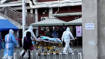 Medical staff moves a patient into a fever clinic at Chaoyang Hospital in Beijing, China December 13, 2022, in this screen grab taken from a Reuters TV video. REUTERS TV via REUTERS