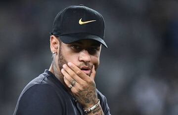 Paris Saint-Germain's Brazilian forward Neymar reacts at the end of the French Trophy of Champions against Rennes.