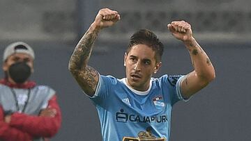 Peru&#039;s Sporting Cristal Alejandro Hohberg celebrates after scoring against Uruguay&#039;s Rentistas during the Copa Libertadores football tournament group stage match at the Monumental Stadium in Lima, on May 19, 2021. (Photo by ERNESTO BENAVIDES / A