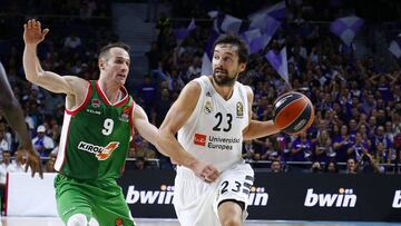 Sergio Llull, ante Marcelinho Huertas.