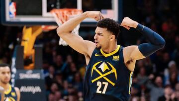 Feb 3, 2018; Denver, CO, USA; Denver Nuggets guard Jamal Murray (27) reacts after a play with Golden State Warriors guard Stephen Curry (30) in the second quarter at the Pepsi Center. Mandatory Credit: Isaiah J. Downing-USA TODAY Sports