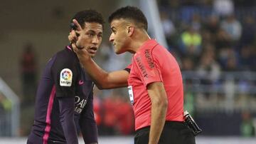 Neymar (left) is sent off against Málaga earlier in April, leading to his current three-match ban.