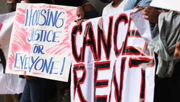 NEW YORK, NEW YORK - SEPTEMBER 01: Demonstrators hold up signs as they gather at Brooklyn Housing court during a &#039;No Evictions, No Police&#039; national day of action on September 01, 2020 in New York City. Various housing organizations organized a d