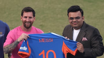 Soccer Football - Lionel Messi Tour of India - Arun Jaitley Stadium, New Delhi, India - December 15, 2025 Argentina and Inter Miami's Lionel Messi poses with ICC Chairman Jay Shah at the stadium during his tour of India REUTERS/Adnan Abidi