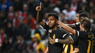 Real Madrid's Brazilian forward #11 Rodrygo celebrates after scoring his team's first goal during the UEFA Champions League 1st round day 3 Group C football match between SC Braga and Real Madrid CF at the Municipal stadium of Braga on October 24, 2023. (Photo by MIGUEL RIOPA / AFP)