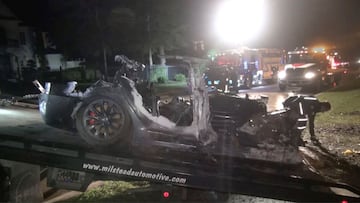 The remains of a Tesla vehicle are seen after it crashed in The Woodlands, Texas, April 17, 2021, in this still image from video obtained via social media. Video taken April 17, 2021. SCOTT J. ENGLE via REUTERS  ATTENTION EDITORS - THIS IMAGE HAS BEEN SUP