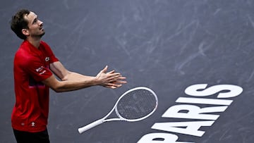 Russia's Daniil Medvedev throws his racket as he plays against Australia's Alexei Popyrin during their men's singles match on day three of the Paris ATP Masters 1000 tennis tournament at the Accor Arena - Palais Omnisports de Paris-Bercy - in Paris on October 30, 2024. (Photo by JULIEN DE ROSA / AFP)