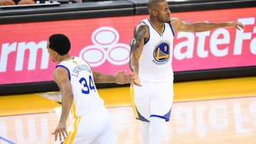 June 2, 2016; Oakland, CA, USA; Golden State Warriors forward Andre Iguodala (9) celebrates with guard Shaun Livingston (34) his three point basket scored against Cleveland Cavaliers during the second half in game one of the NBA Finals at Oracle Arena. Mandatory Credit: Bob Donnan-USA TODAY Sports