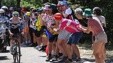 Movistar Team's Spanish rider Enric Mas cycles in the ascent of Mont Ventoux during the 16th stage of the 112th edition of the Tour de France cycling race, 171.5 km between Montpellier and Mont Ventoux, southern France, on July 22, 2025. (Photo by Anne-Christine POUJOULAT / AFP)
