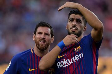 Lionel Messi y Luis Su¨¢rez.