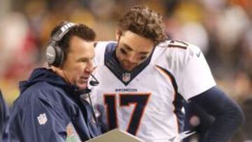 Gary Kubiak y Brock Osweiler.