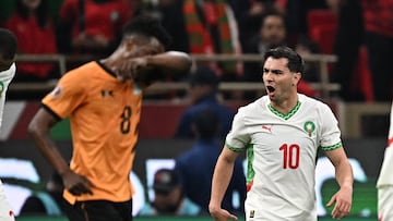 Morocco's forward #10 Brahim Diaz (R) celebrates scoring his team's second goal during the Africa Cup of Nations (CAN) group stage football match between Zambia and Morocco at Prince Moulay Abdellah Stadium in Rabat on December 29, 2025. (Photo by Gabriel BOUYS / AFP)