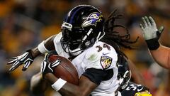 Alex Collins usa un visor oscuro para luchar contra las migrañas