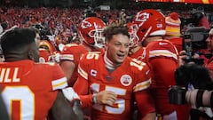 Kansas City Chiefs quarterback Patrick Mahomes (15) celebrates the win against the Buffalo Bills in overtime in the AFC Divisional playoff football game at GEHA Field at Arrowhead Stadium.