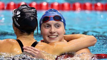 INDIANAPOLIS, INDIANA - NOVEMBER 05: Katie Ledecky of the United States celebrates with Summer McIntosh of Canada after breaking the world record in the Women's 800m Freestyle final on Day 3 of the FINA Swimming World Cup 2022 Leg 3 at Indiana University Natatorium on November 05, 2022 in Indianapolis, Indiana.   Maddie Meyer/Getty Images/AFP