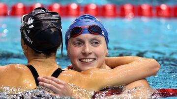 INDIANAPOLIS, INDIANA - NOVEMBER 05: Katie Ledecky of the United States celebrates with Summer McIntosh of Canada after breaking the world record in the Women's 800m Freestyle final on Day 3 of the FINA Swimming World Cup 2022 Leg 3 at Indiana University Natatorium on November 05, 2022 in Indianapolis, Indiana.   Maddie Meyer/Getty Images/AFP