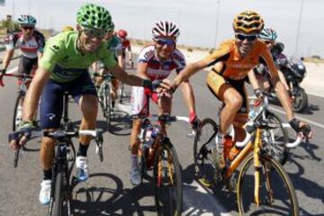 los españoles, Alejandro Valverde, del equipo Movistar, Joaquin "Purito" Rodríguez, del Katusha y Samuel Sánchez, del Euskaltel, durante la vigésima primera etapa disputada entre Leganes y Madrid, de 142,2 kilómetros