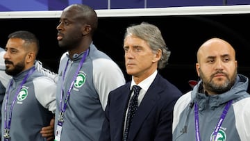 Saudi Arabia's Italian coach Roberto Mancini (2nd-R) looks on before the start of the Qatar 2023 AFC Asian Cup Group F football match between Kyrgyzstan and Saudi Arabia at the Ahmad Bin Ali Stadium in Al-Rayyan, west of Doha on January 21, 2024. (Photo by KARIM JAAFAR / AFP)