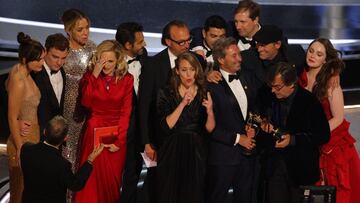 Philippe Rousselet, Fabrice Gianfermi and Patrick Wachsberger celebrate after winning the Oscar for Best Picture for &quot;CODA&quot; at the 94th Academy Awards in Hollywood, Los Angeles, California, U.S., March 27, 2022. REUTERS/Brian Snyder