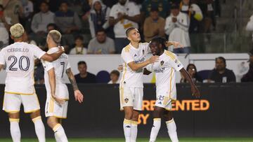 Jun 15, 2024; Carson, California, USA; LA Galaxy forward Joseph Paintsil (28) celebrates with forward Gabriel Pec (11) after scoring a goal in the second half against Sporting Kansas City at Dignity Health Sports Park. Mandatory Credit: Kiyoshi Mio-USA TODAY Sports