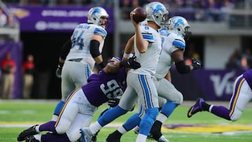 MINNEAPOLIS, MN - NOVEMBER 6: Matthew Stafford #9 of the Detroit Lions is hit by Danielle Hunter #99 of the Minnesota Vikings while throwing during the first half of the game on November 6, 2016 at US Bank Stadium in Minneapolis, Minnesota. Adam Bettcher/Getty Images/AFP
== FOR NEWSPAPERS, INTERNET, TELCOS & TELEVISION USE ONLY ==
