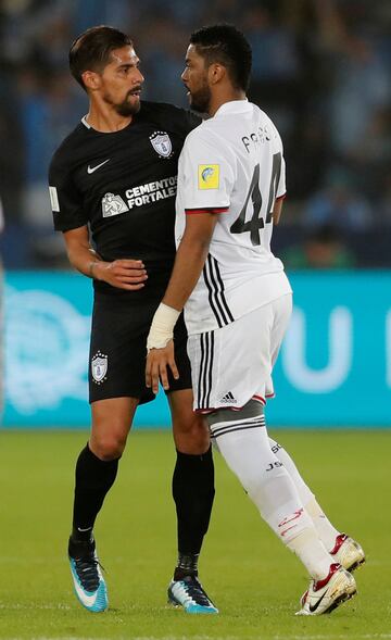 Soccer Football - FIFA Club World Cup Third Place Match - Al Jazira vs CF Pachuca - Zayed Sports City Stadium, Abu Dhabi, United Arab Emirates - December 16, 2017   Pachuca's Franco Jara clashes with Al Jazira’s Fares Juma        REUTERS/Amr Abdallah Dalsh