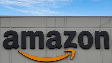 The Amazon logo is seen outside its JFK8 distribution center in Staten Island, New York, U.S. November 25, 2020.  REUTERS/Brendan McDermid.